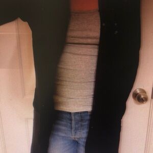 Black Long Coat with Gray Top and Blue Jeans